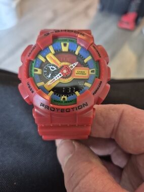 Casio Red G-Shock Watch with Multicolor Dial Accents